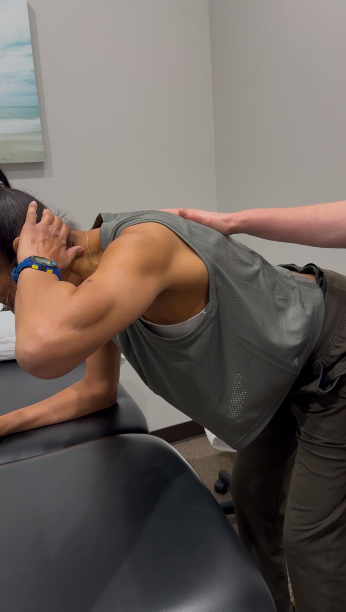 Karolyn showing visible muscle definition after 6 months of training