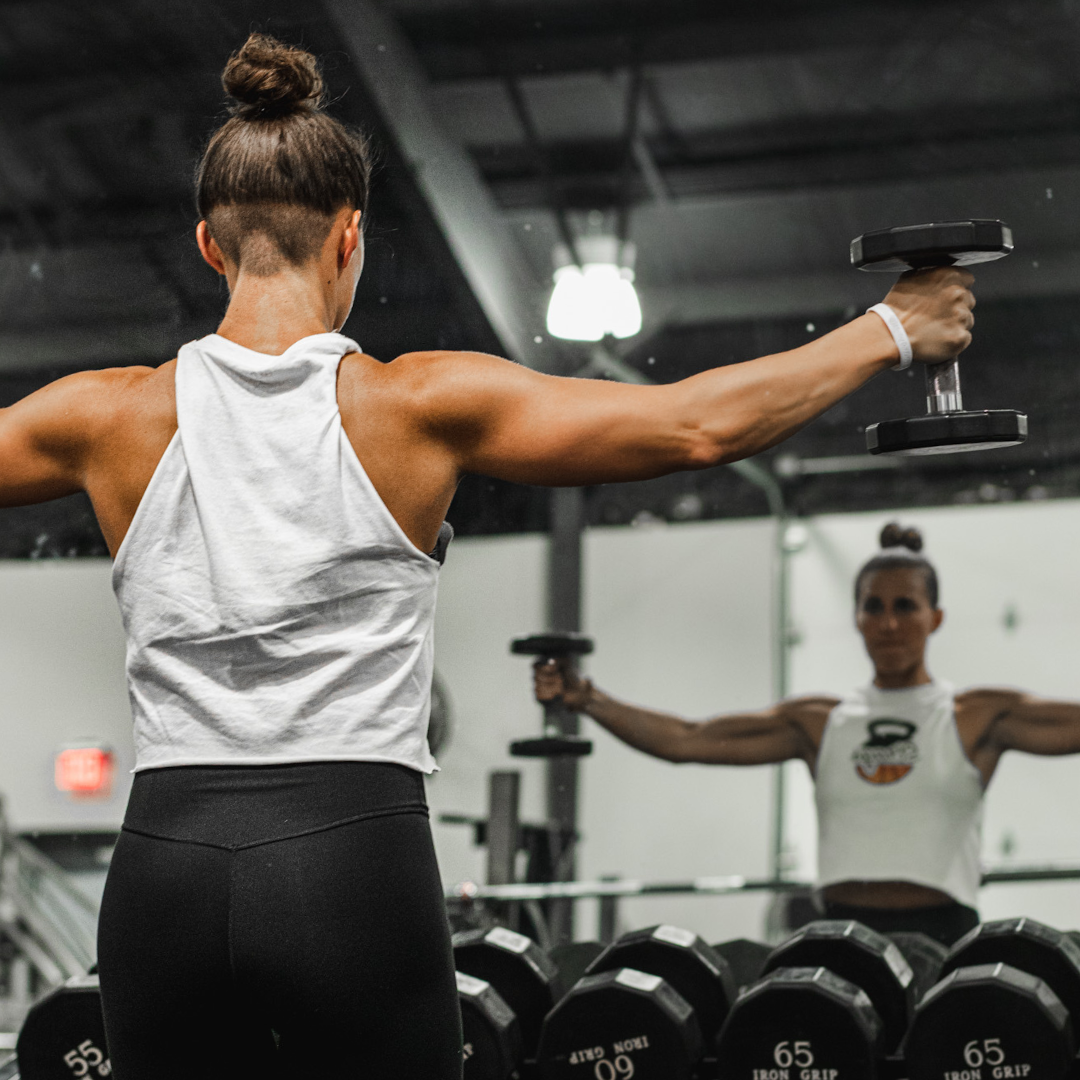 Christen Strags coaching in the weight room